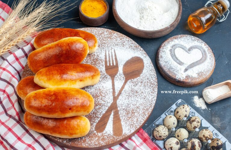 top view tasty dinner rolls fork spoon imprint powdered sugar wood board quail eggs oil bottle turmeric flour bowls table